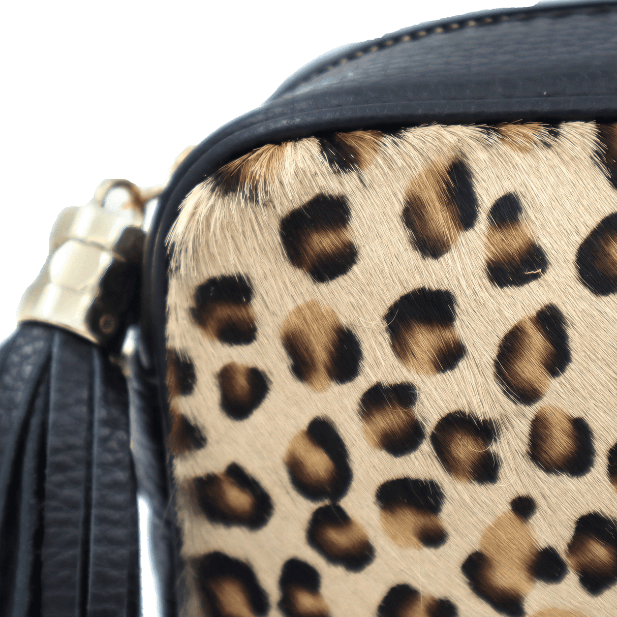 Természetes bőr válltáska állatmintával - fekete