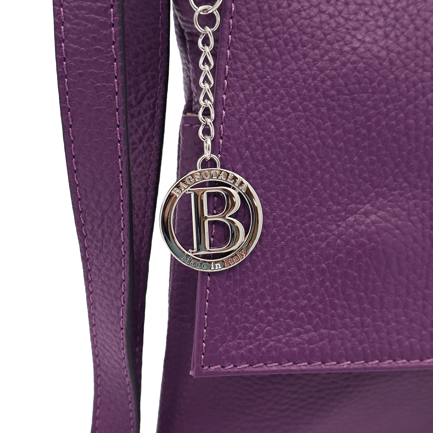 Természetes bőr válltáska sok zsebbel - lila