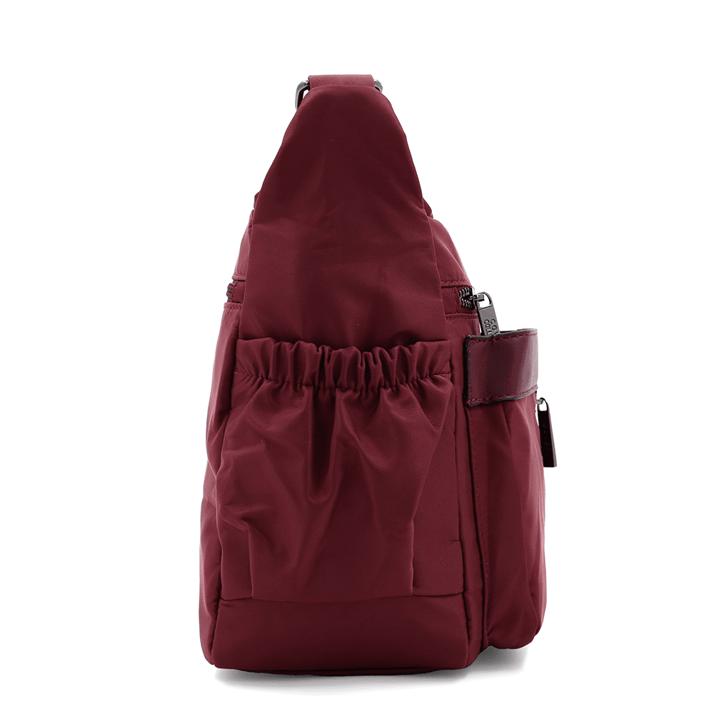 Női válltáska szövetből, sok zsebbel - bordó