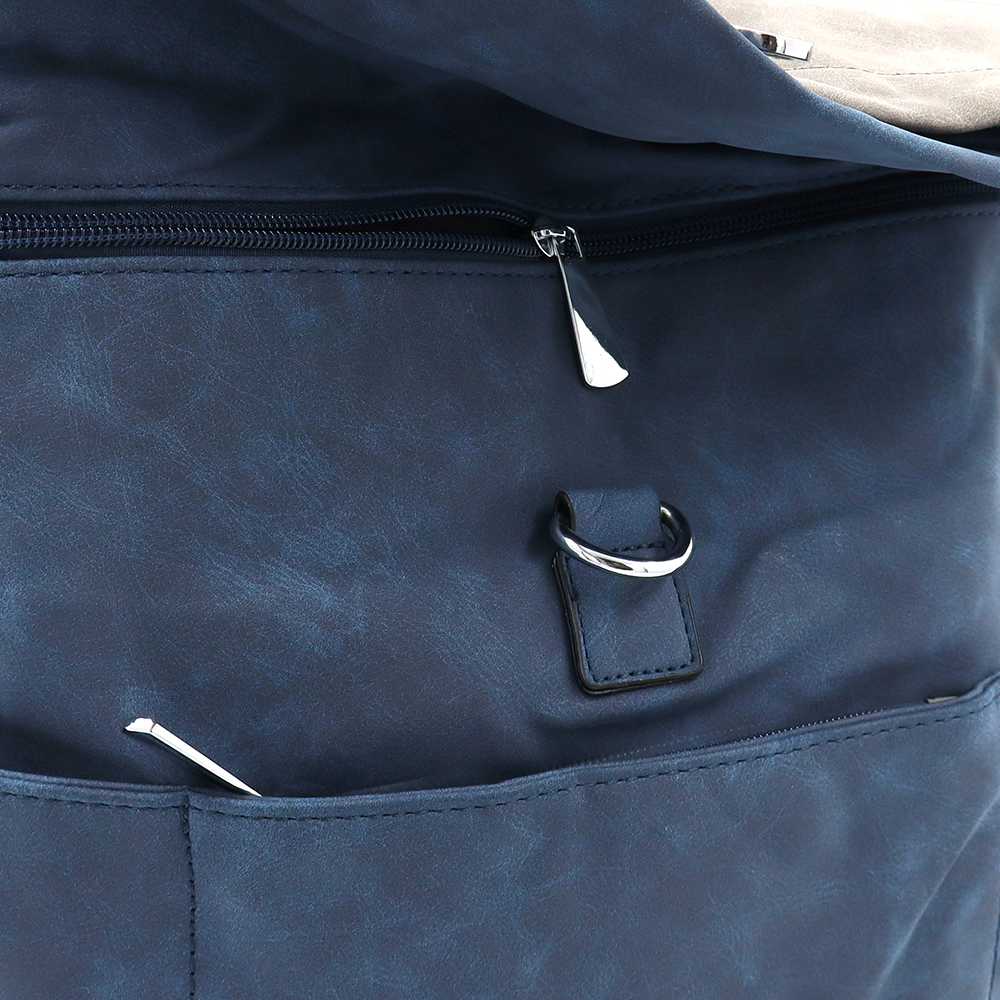 2 az 1-ben – Női hátizsák és táska sok zsebbel – sötétkék