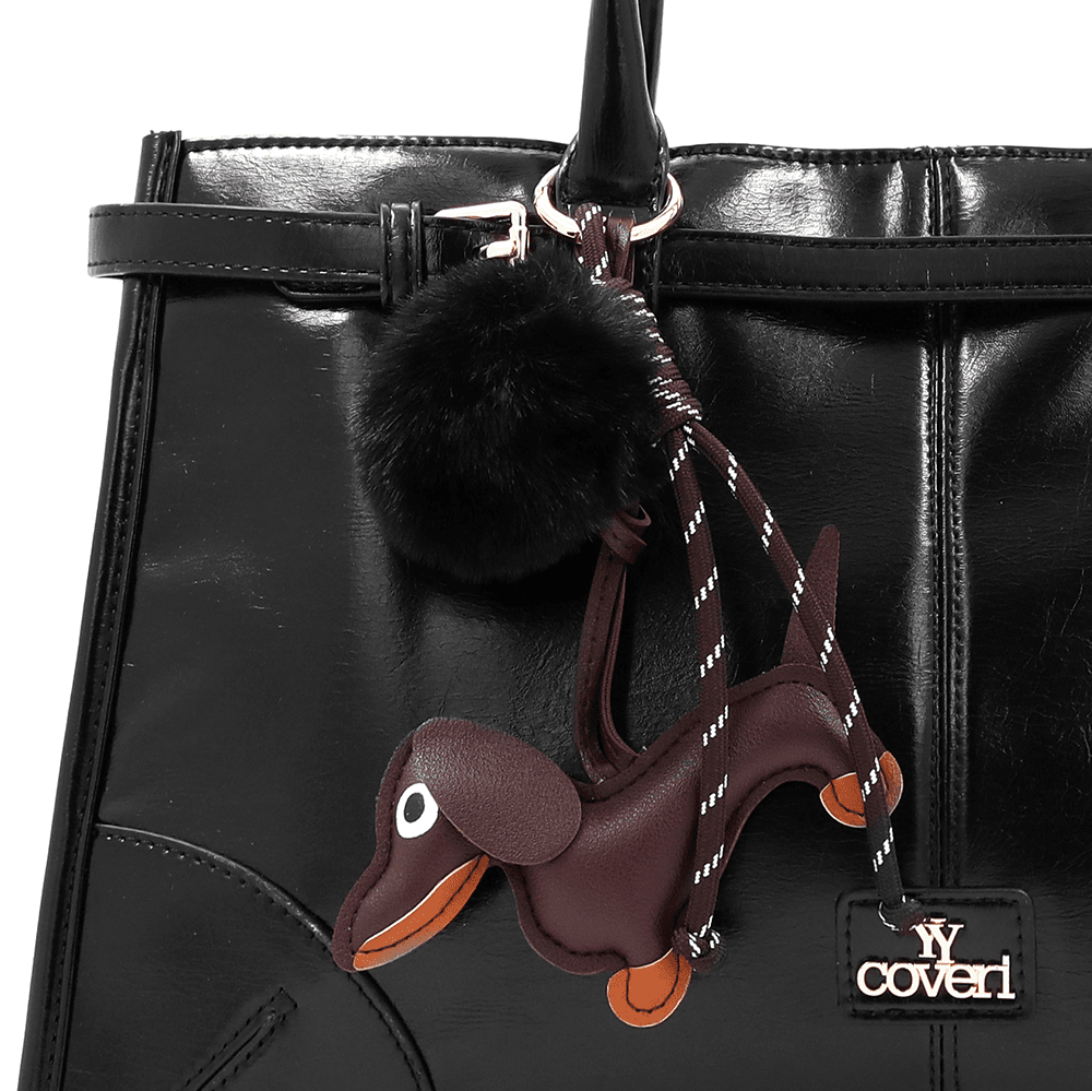 Női táska kutyus és pelyhek medállal - fekete