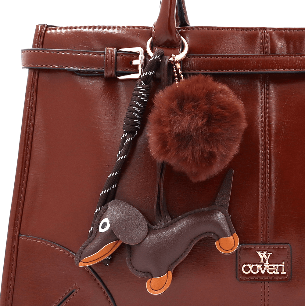 Női táska kutyus és bolyhos medálokkal - cserépbarna