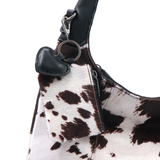 Női táska típusú táska tehénmintás dizájnnal és lógó pénztárcával – fekete